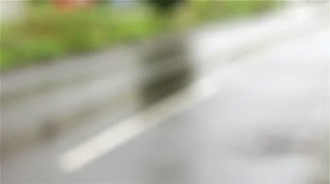 Car traffic in the rain Stock Footage 8578521