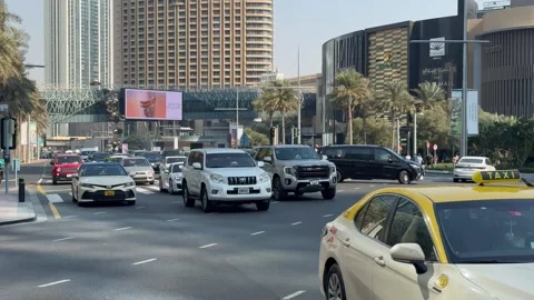 Car traffic on the road in the city. Dubai UAE 30 August 2026 Stock Footage 344874953