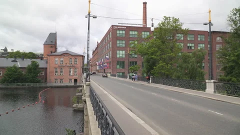 Car traffic on Satakunta Bridge in central Tampere, Finland Stock Footage 231212255