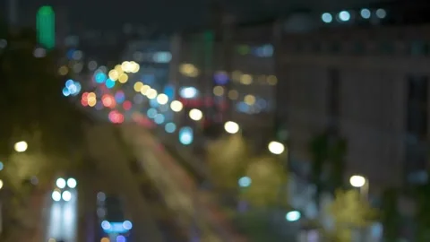 Car traffic with a selective focus by night Stock Footage 196943636