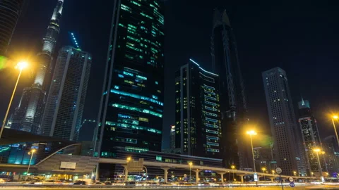 Car traffic on Sheikh Zayed road at night in downtown, Burj Khalifa Dubai Mall Stock Footage 87744844