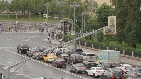 Car traffic on a street in the summer Stock Footage