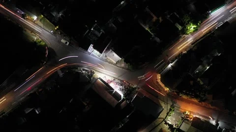 Car traffic time lapse turns day to night. Traffic on Bali. Stock Footage 273833780