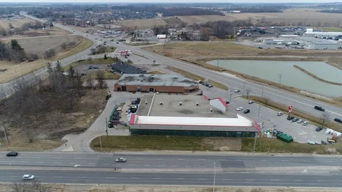 Car Traffic In Triangle Road Pattern By Swamp Pond In Early Spring Stock Footage 122267076