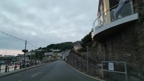 Car Travel on Looe River and Beach Town of England UK Stock Footage 317077942