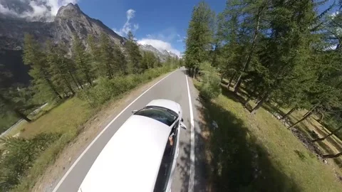 Car travelling inside an alpine valley, fisheye view Stock Footage 137395162
