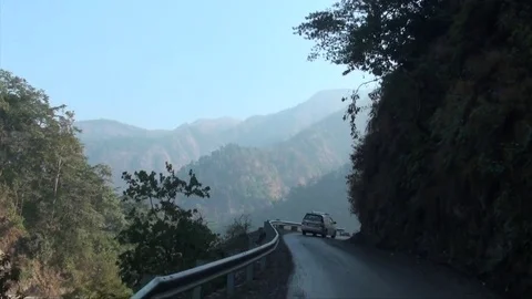 Car travelling through mountain Stock Footage 72330160