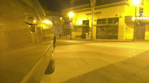 A car travels on a busy city street. Stock Footage