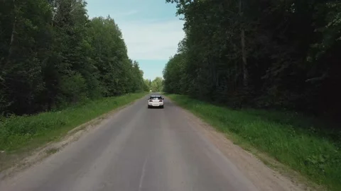 Car trip to the forest. We drive a car outside the city. 動画素材 158605981