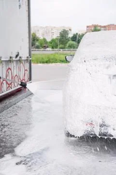 Car trunk in soapy foam from a detergent Stock Photos