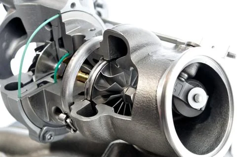 Car turbocharger showing inside, isolated on white background. Stock Photos