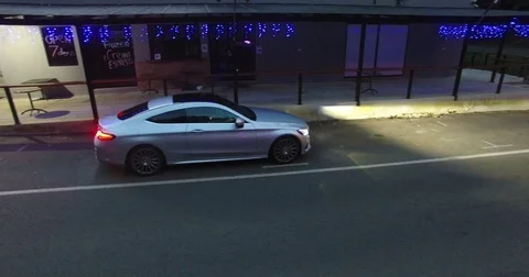 Car turning around and getting onto road Stock-Footage 72584685
