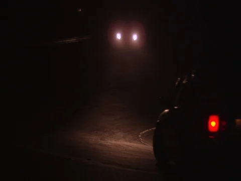 Car Turns On Highway At Night Stock Footage 82265733