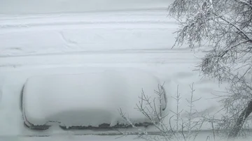 A car under the snow Stock Footage 85706797