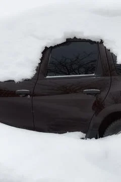 Car under the snow Stock Photos