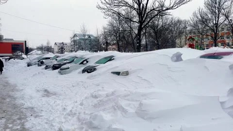 Car under thick blanket of snow after storm. Vehicles buried under ice. Stock Footage 263006486