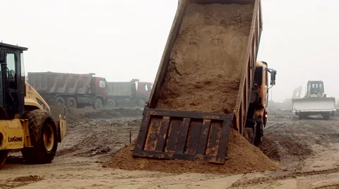 Car unloads sand Stock Footage 47700443