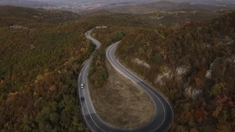 Car vehicle drive on mountain range nature aerial view in autumn day Stockbeeldmateriaal 254022530