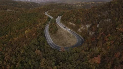 Car vehicle drive on mountain range nature aerial view in autumn day Stockbeeldmateriaal 254022778