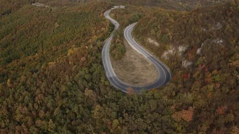 Car vehicle drive on mountain range nature aerial view in autumn day Stock Footage 254022827