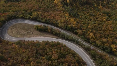 Car vehicle drive on mountain range nature aerial view in autumn day Stock Footage 254022943