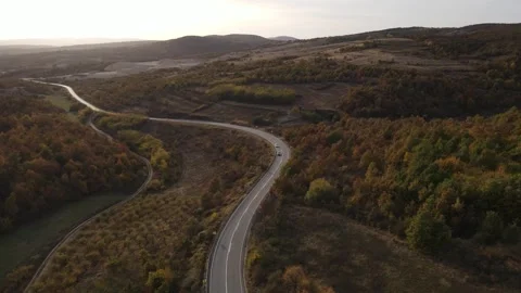 Car vehicle drive on mountain range nature aerial view in autumn day Stock Footage 254023824
