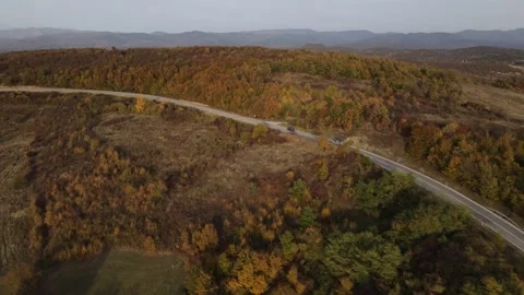 Car vehicle drive on mountain range nature aerial view in autumn day Stockbeeldmateriaal 254023838