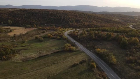 Car vehicle drive on mountain range nature aerial view in autumn day Stock Footage 254024070