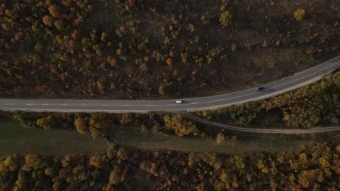 Car vehicle drive on mountain range nature aerial view in autumn day Stockbeeldmateriaal 254024172