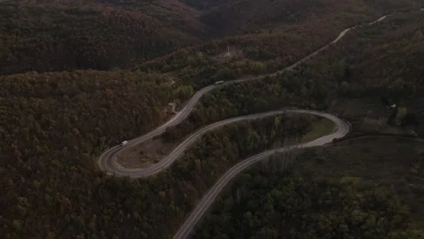 Car vehicle drive on mountain range nature aerial view in autumn day Stock Footage 254519955