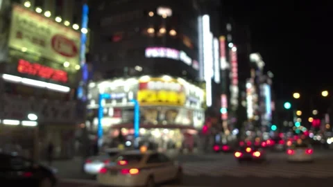 In-Car Video - Night View of Kabukicho from Yasukuni Street Weekend Bustling Stock Footage 333153286