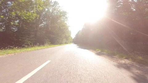 Car View Driving Forward Facing Sun 4K Road Travel Summer Adventure GoPro Stock Footage 113069940