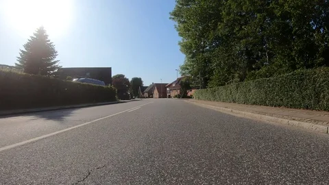 Car View Driving Forward Small City 4K Road Travel Summer Adventure GoPro Stock Footage 113071229