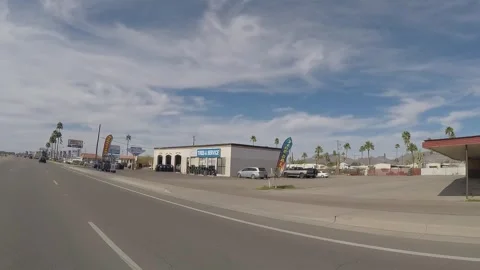 Car View Driving Past Small Businesses- Apache Junction Arizona 4K Video stock 313100454