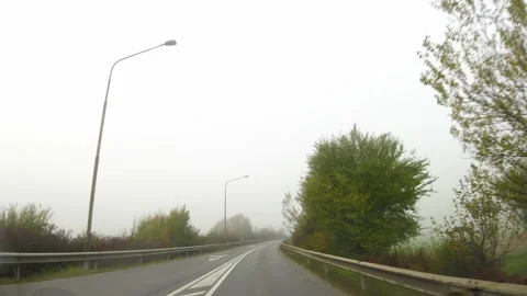 Car view of driving on paved countryside road Stock Footage 167016427