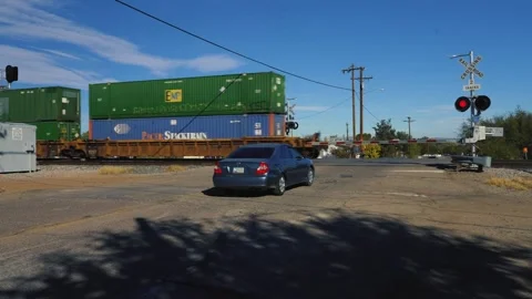 Car Waits the Train to Pass Stock Footage 279621994