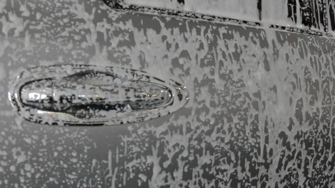 Car wash with foam Stock Footage 121394792