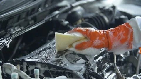 Car wash with foam sponge engine compartment Stock Footage 108757093