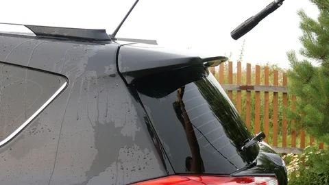 Car wash using high pressure water jet. Stock Footage 113536592