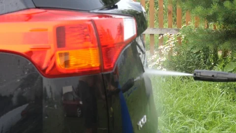 Car wash using high pressure water jet. Stock Footage 113536626