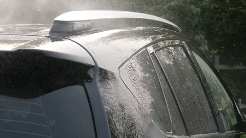 Car wash using high pressure water jet. Stock Footage 113536680