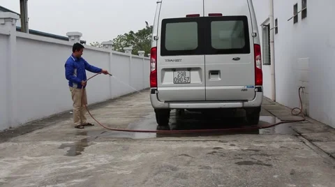 Car wash worker Stock Footage 64578192