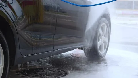 Car washing Cleaning car using high pressure water Contactless self-service Stock Footage 156750308