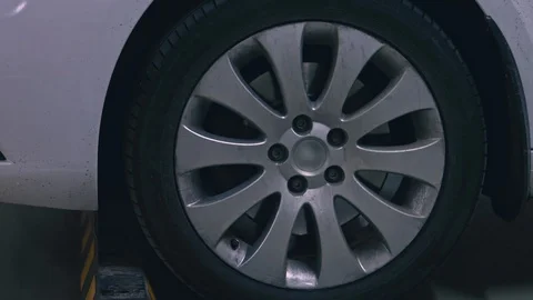 Car wheel on a car - closeup Stock Footage 106928501