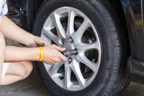 Car wheel changing Stock Photos