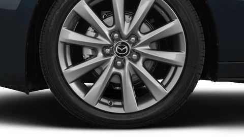 Car wheel close up Deep Crystal Blue Mica 2019 Mazda MAZDA3 w/ Preferred Package Stock Footage 160068534