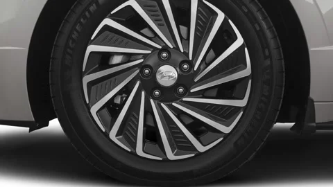 Car wheel close up Shimmering Silver Metallic 2020 Hyundai Sonata Hybrid Limited Stock Footage 159592143