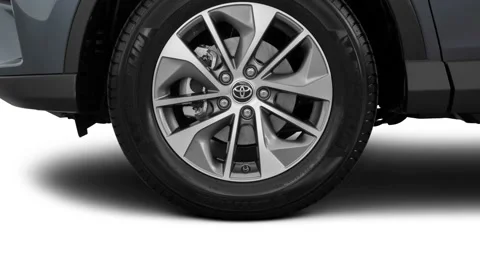 Car wheel close up side view Magnetic Gray Metallic 2016 Toyota RAV4 Hybrid XLE Stock Footage 159862147