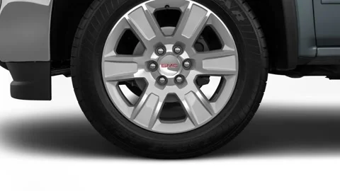 Car wheel close up side view Light Steel Gray Metallic 2016 GMC Sierra 1500 SLE Stock Footage 159870891