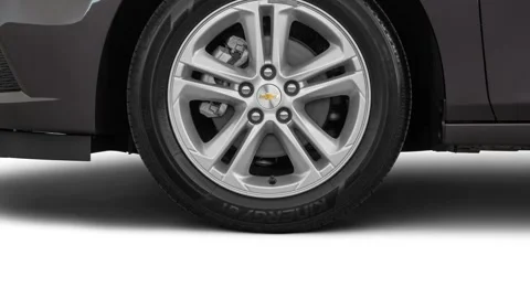 Car wheel close up side view Tungsten Metallic 2017 Chevrolet Cruze LT Automatic Stock Footage 159913134